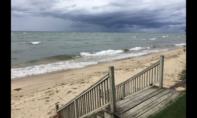 Port Austin Condo | Condo #5 Upper level condo with lovely Lake Huron sunset views .