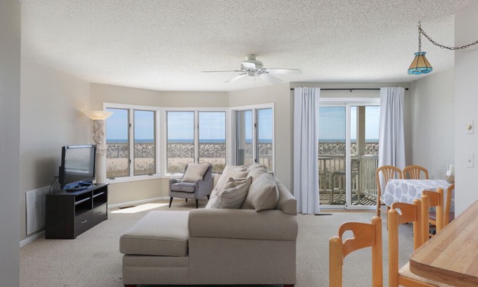 Seaside Heights Condo | Condo on the beach with private patio overlooking the ocean.