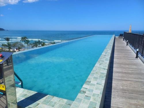 Praia Grande Apartment | Conforto e estilo pertinho do mar