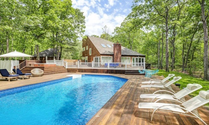 Northwest Harbor House | Contemporary retreat on 1.4 wooded acres with an open floorplan and private.