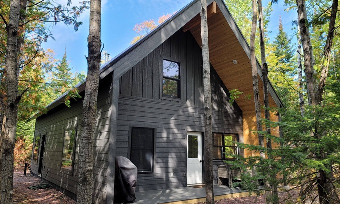 Copper Harbor House | Copper Harbor Chalet. A 2 bed/2 bath cozy wooded retreat near Lake Superior