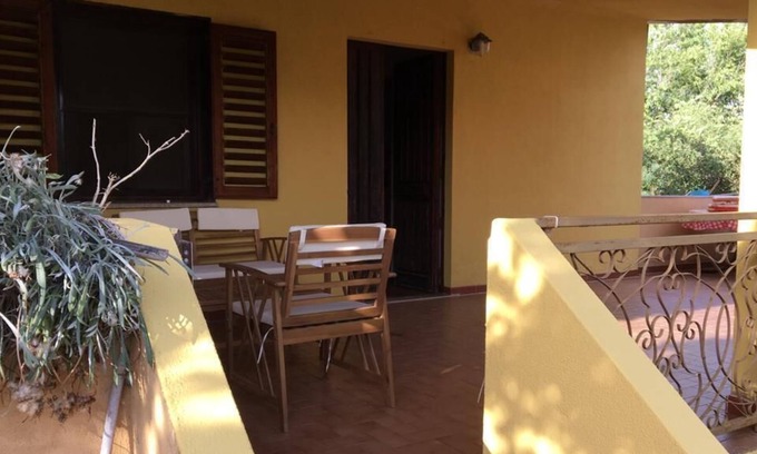 Torre di Bari Apartment | Cosy Apartment “Casa Sa Marina” Close to Beach with Terrace & Garden; Parking Available, Pets Allowed