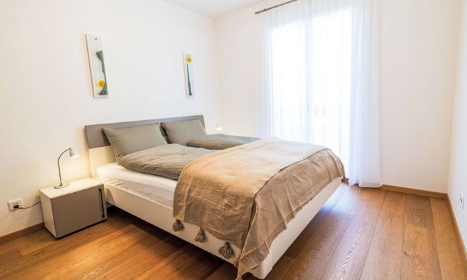 Leukerbad Apartment | Cosy apartment for 8 guests with hot tub, WIFI, TV, balcony and panoramic view