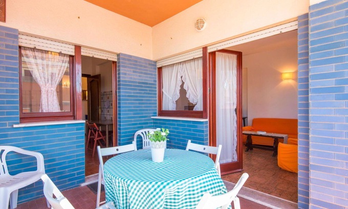 Torvaianica Apartment | Cosy apartment for 4 guests with WIFI, TV, terrace and parking