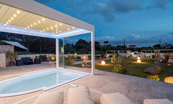Eden Beach Villa | Cosy apartment in villa for 3 people with WIFI, pool, A/C, TV, patio and parking