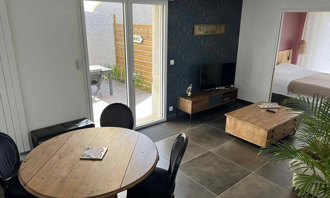 Grezieu-la-Varenne Apartment | Cosy apartment with terrace, garden and parking, 15 km from Lyon