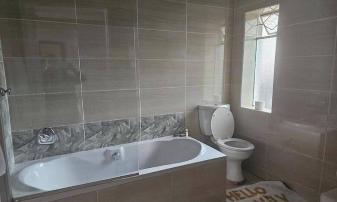 Greater Johannesburg Metropolitan Area House | Cosy in Jozy-Guesthouse "home away from home"
