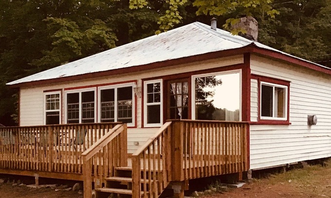 Minden House | Cottage on Horseshoe Lake, Minden, level lot, south facing, sandy beach