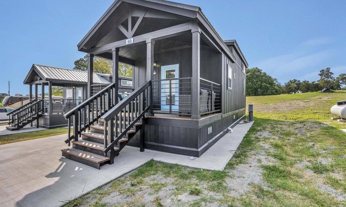 Brenham Cottage | Cottage with Loft - Includes 3 queen beds (one in master and 2 in loft), a fully equipped kitchen, dining area, private bath and shower, TVs, Wifi, all utilities, access to all resort amenities. Pets are not permitted in this cottage.
