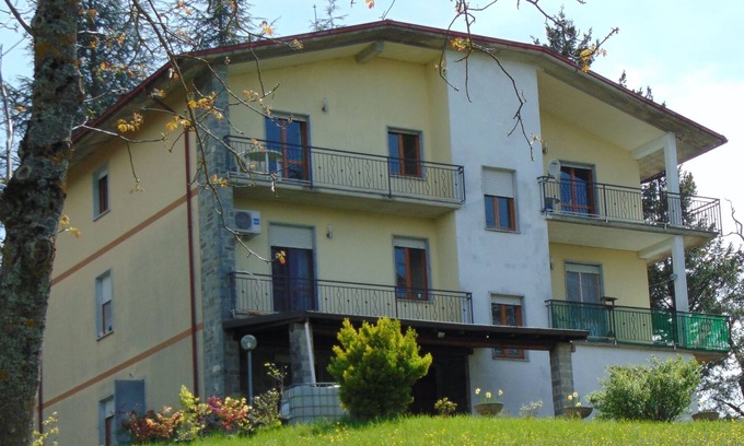 Albareto Apartment | Countryside Apartment With Private Balcony to Enjoy Mountain Views