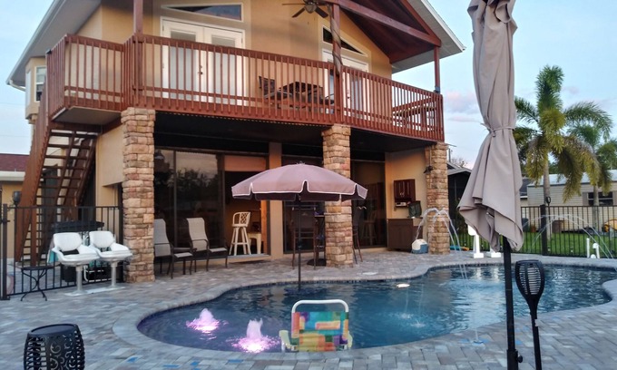 Fort Myers Shores House | Couples Retreat upstairs suite off the Caloosahtchee River with private pool
