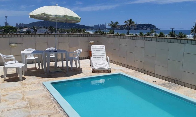 Enseada Apartment | COVERAGE WITH POOL, CHURRASQ, 03 DORM. - GUARUJA ENSEADA - 50 M FROM THE BEACH