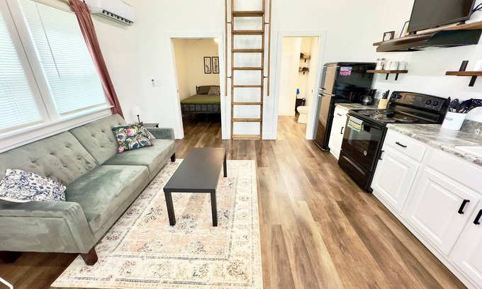 Albertville House | Coyote Tiny Luxury Cabin on Lake with Arcade