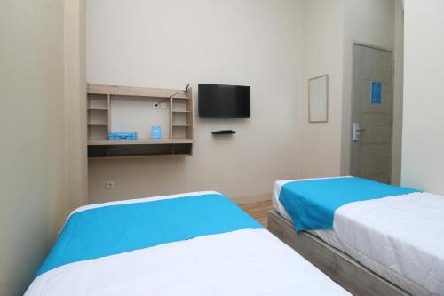 Kebon Kacang House | COZROOMS near MRT, Plaza Indonesia, and Grand Indonesia