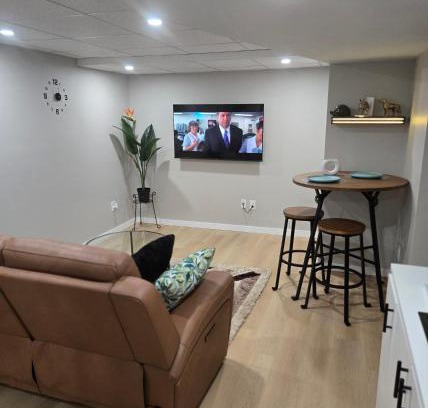 Pinehouse Apartment | Cozy 2 bedroom basement with side entrance