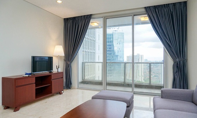 Karet Apartment | Cozy 2BR at Empyreal Epicentrum Apartment By Travelio