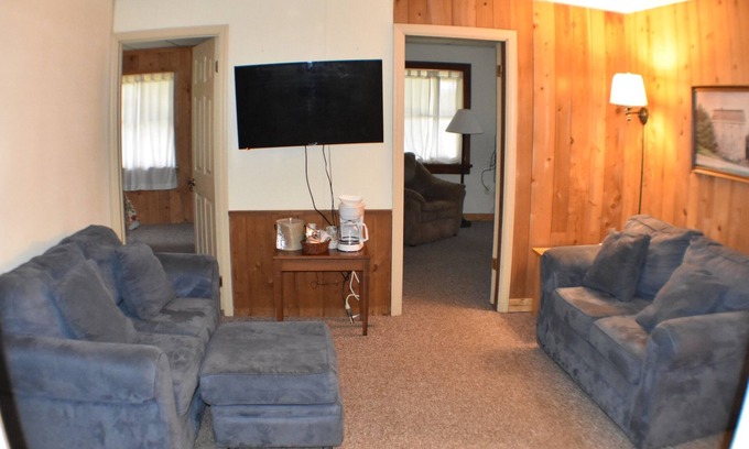 Stahlstown Cabin | Cozy 3 bedroom suite with living room. Close to hiking trails, ski resorts and family parks!