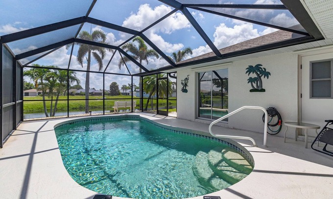 Pebble Beach House | Cozy 3BR, 2BA canal-front home with private pool and serene views. Just 20 minutes from the beach—your perfect Florida escape!