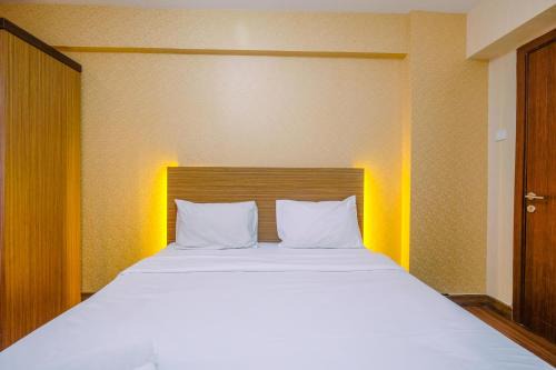 Depok Apartment | Cozy and Simple Living Studio Apartment at Cinere Resort By Travelio