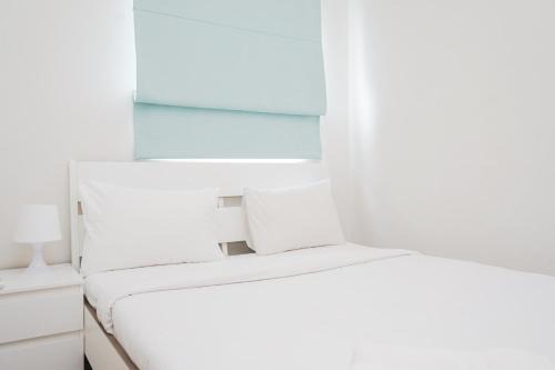 Serpong Apartment | Cozy and Spacious 1BR Apartment at Parkland Avenue By Travelio
