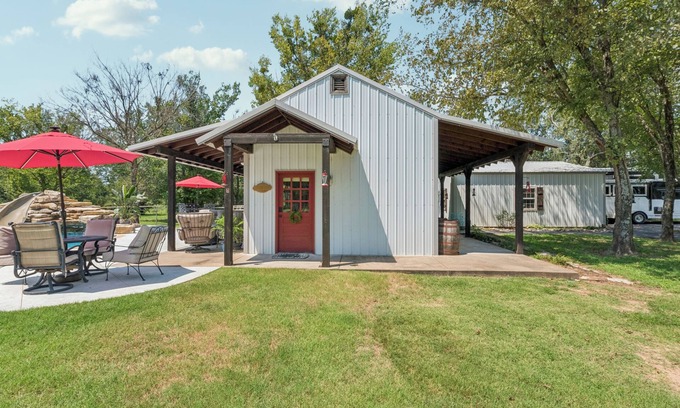 Okmulgee County Cabin | Cozy Cabin in the Country with resort style pool! Secluded, Slide and Waterfall
