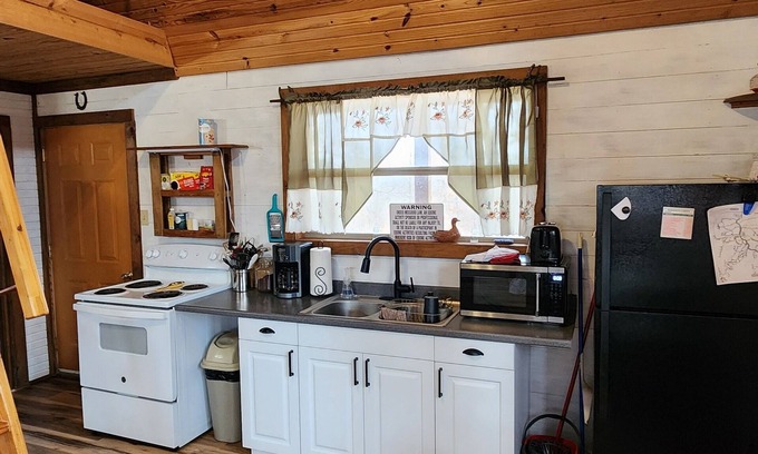 Pineville Cabin | Cozy cabin nestled on the edge of Huckleberry Conservation, w/firepit!