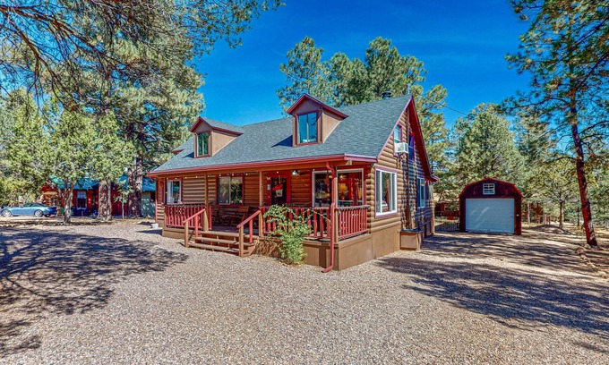 Overgaard Cabin | Cozy cabin with fireplace, farmers porch, central AC & close to trails!