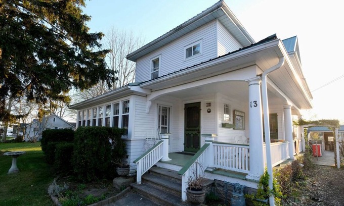 Port Burwell House | Cozy Corner Retreat - Pool, Sunroom, 0.7 Acres, 5 Minutes to the Beach