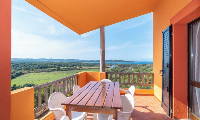 Barrabisa Apartment | Cozy Holiday Apartment "Conchiglia Blu" with Garden