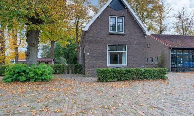 Municipality of Westerveld House | Cozy Holiday Home by the Canal in Dwingeloo
