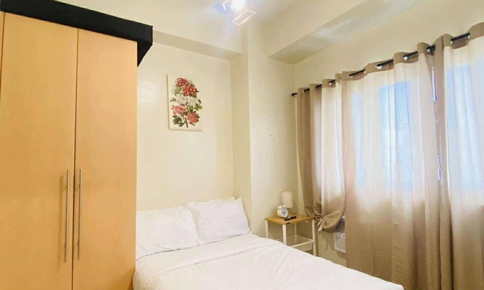 Iloilo Condo | Cozy Iloilo City Condo Room with Shared Pool