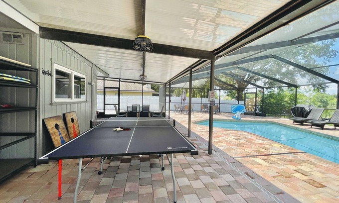 Citrus Park House | Cozy Lake House with Heated Salt Water Pool