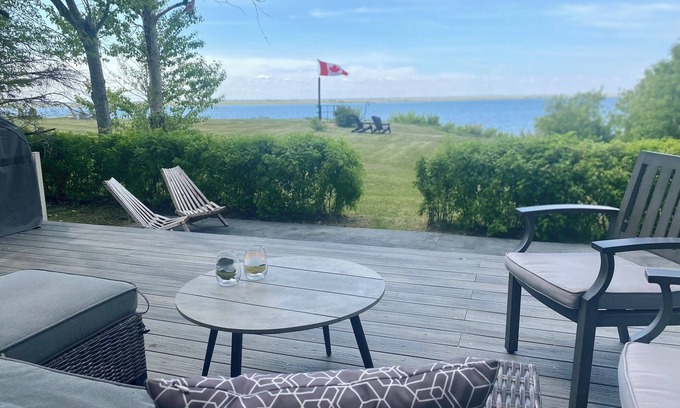 Island View Cottage | Cozy Lakefront Oasis on Last Mountain Lake with your own backyard Putting Green