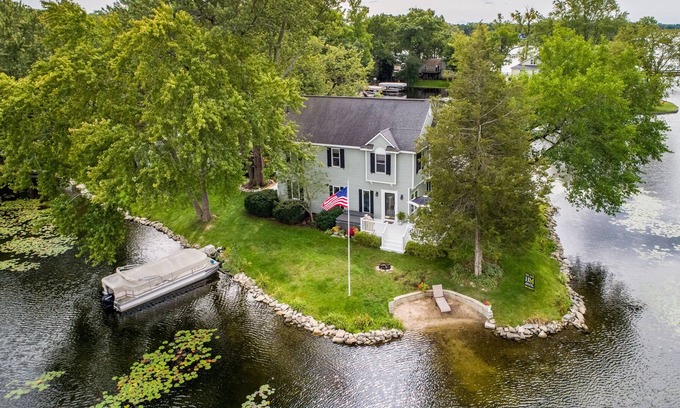 Wolverine Lake House | Cozy, lakefront retreat on private peninsula.