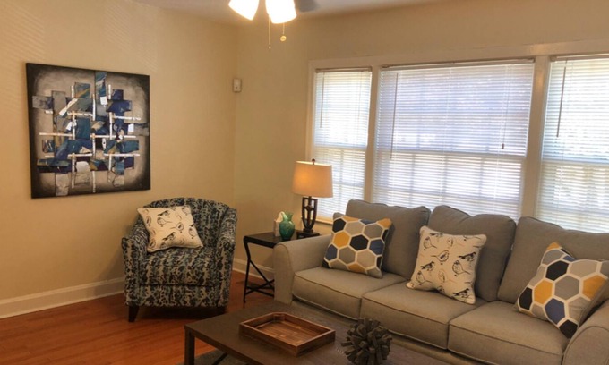 Huntsville House | Cozy little yellow jewel box home away from home