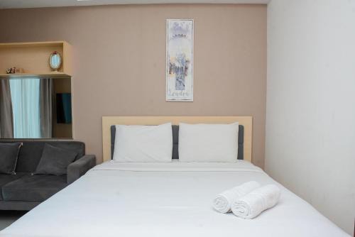Pekayon Jaya Apartment | Cozy Living 1BR at Grand Kamala Lagoon Apartment By Travelio