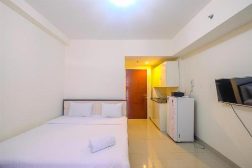 Pondokcina Apartment | Cozy Living Studio Apartment Taman Melati Margonda near Universitas Indonesia By Travelio