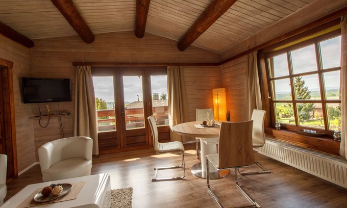 Steina House | Cozy log cabin with 2 apartments on a slope in a quiet location