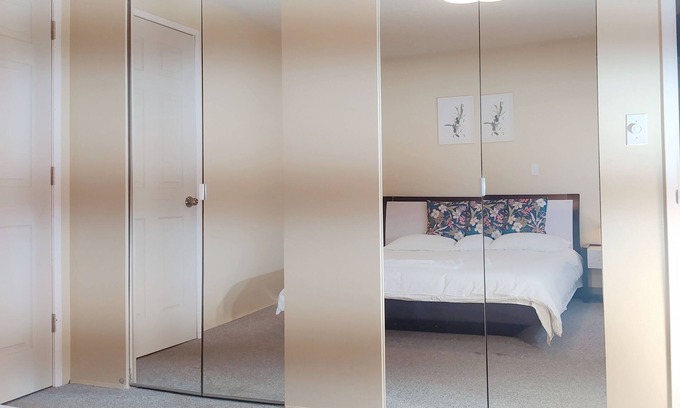 Richmond House | Cozy master bedroom with private bathroom & queen bed