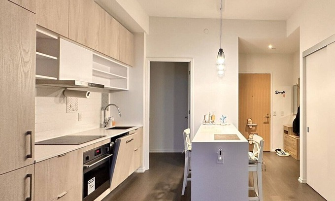 Chaplin Estates Apartment | Cozy Midtown Condo Steps to Subway & Amenities