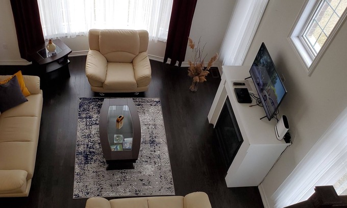 Carrying Place House | cozy modern cottage with soaker tub and fireplace