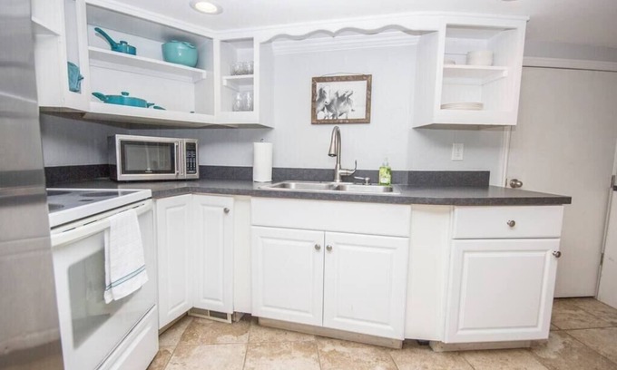 Marriott-Slaterville Apartment | Cozy Ogden Getaway | Close to Ski Resorts | Farm Experience | Patio