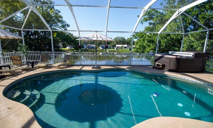 Palm Harbor House | Cozy Palm Harbor Family Oasis | Heated Pool & Spa | Pet-Friendly | Near Honeymoo