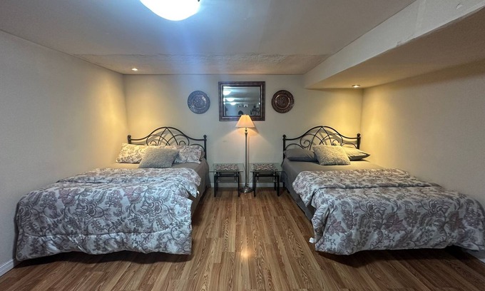 Brampton House | "Cozy, private basement with kitchenette, washroom, and small gym.
