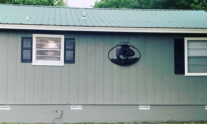Wilburn Cabin | Cozy riverfront cabin with great outdoor space including a hot tub!