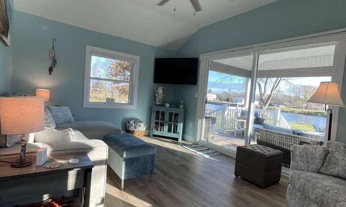 Oscoda Cottage | Cozy riverfront cottage with an easy beach-inspired coastal MI vibe!