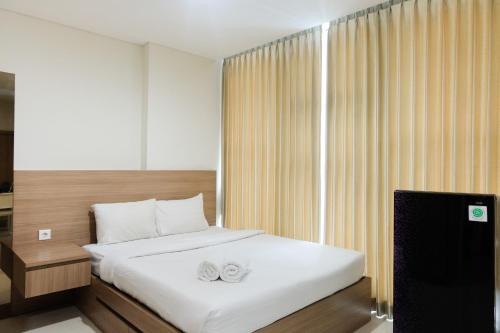 Tangerang Apartment | Cozy Studio Apartment at Brooklyn Alam Sutera By Travelio