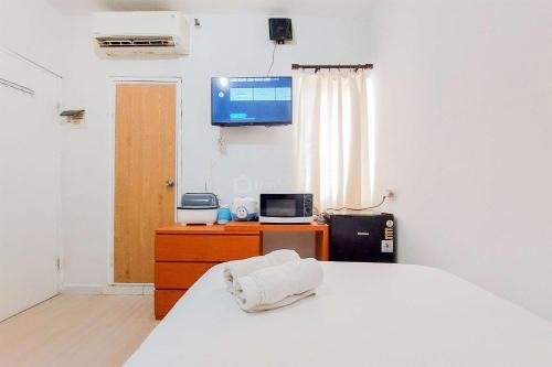 Tangerang Apartment | Cozy Studio (No Kitchen) Apartment Aeropolis Residence By Travelio