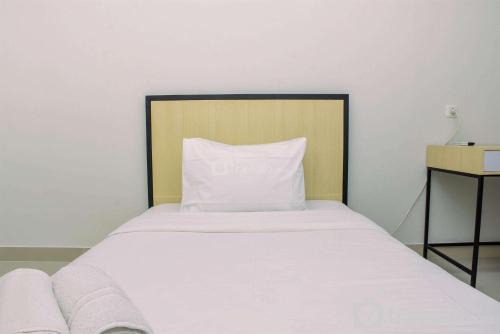 Pondokcina Apartment | Cozy Studio with Single Bed at Evenciio Margonda Apartment By Travelio