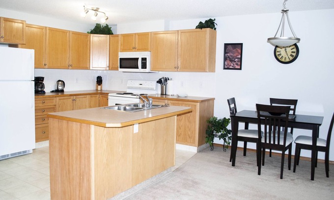 Red Deer Condo | Cozy Two Bedroom Plus a Den in Devonshire on the Park!